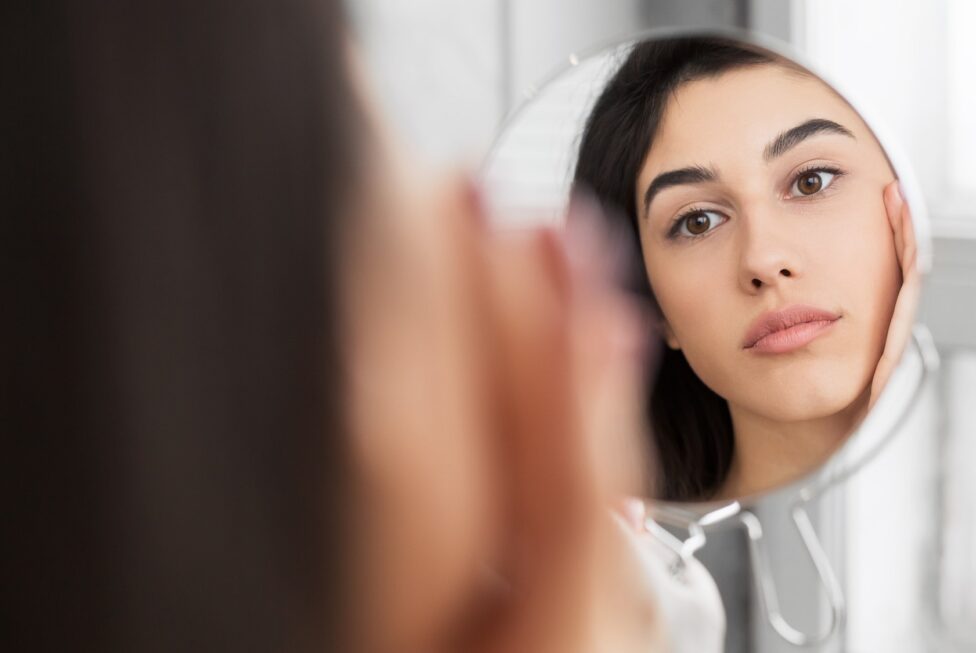 Girl Touching Face Looking At Perfect Skin In Mirror, Panorama