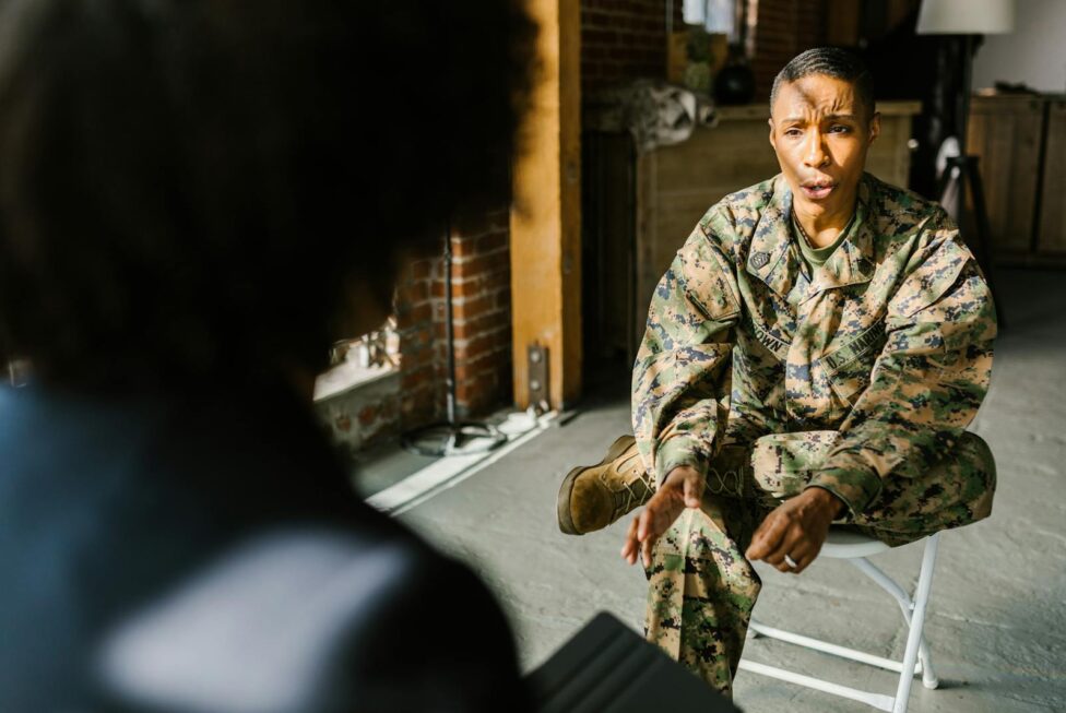 Photo of Soldier Talking to a Therapist